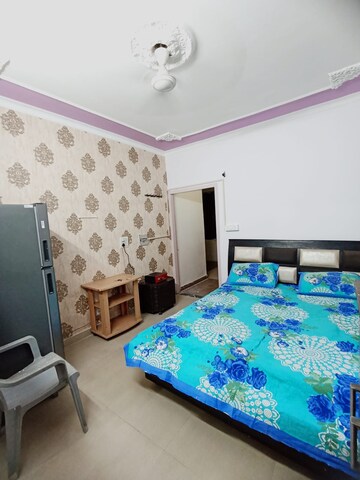 Bedroom in 1 RK Apartment at Hanumant Bollywood Heights, Dhakoli Village – for Rent