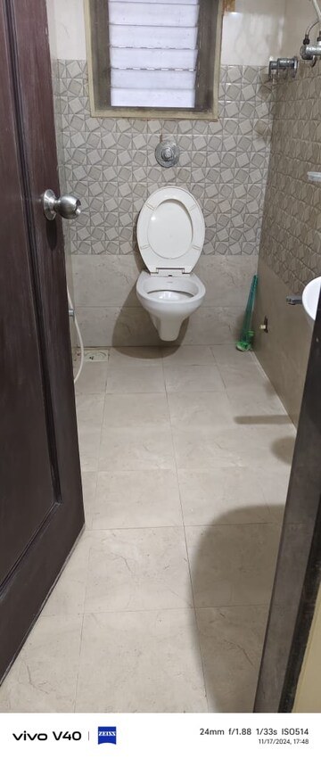 Bathroom in 2 BHK Apartment at UK La Serena CHSL, Malad West – for Rent