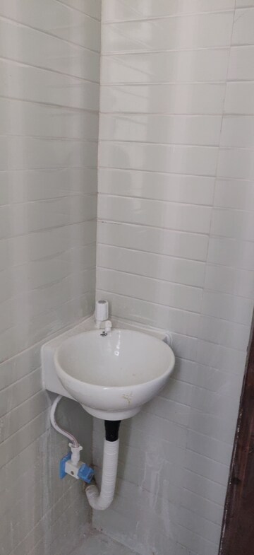 Bathroom in 1 RK Apartment at RPS Savana, Sector 88 – for Rent
