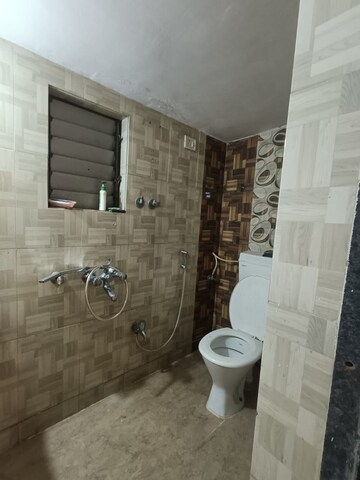 Bathroom in 1 BHK Apartment at Vasudev Sky High, Mira Road – for Rent