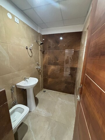 Bathroom in 3 BHK Apartment at Dhakoli Village – for Rent