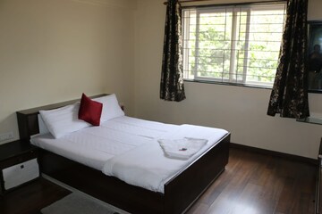 Bedroom in 3.5 BHK Apartment at Magarpatta Laburnum Park, Hadapsar – for Sale