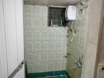 Bathroom in 1 BHK Apartment at River Park Complex, Dahisar East – for Rent