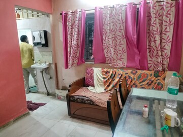 Living Room in 1 BHK Apartment at River Park Complex, Dahisar East – for Rent