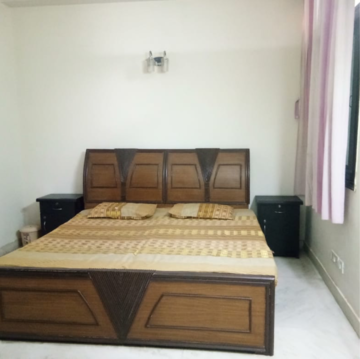Bedroom in 2 BHK Builder Floor at East Of Kailash – for Rent