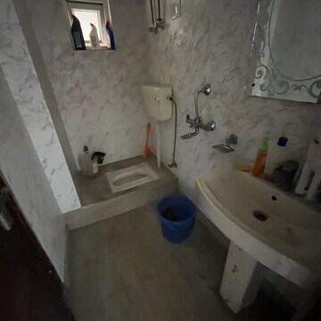 Bathroom in 2.5 BHK Apartment at Raj Nagar Extension – for Rent