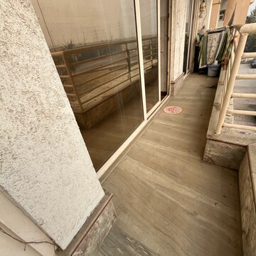 Balcony in 2.5 BHK Apartment at Raj Nagar Extension – for Rent