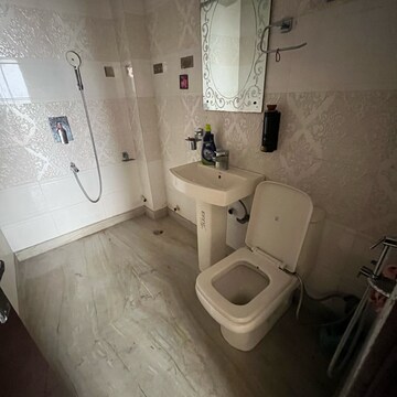 Bathroom in 2.5 BHK Apartment at Raj Nagar Extension – for Rent