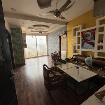 Living Room in 2.5 BHK Apartment at Raj Nagar Extension – for Rent