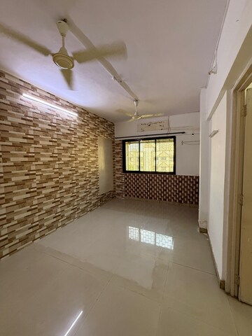 Bedroom in 1 BHK Apartment at Raj Shivam Society, Dahisar East – for Rent