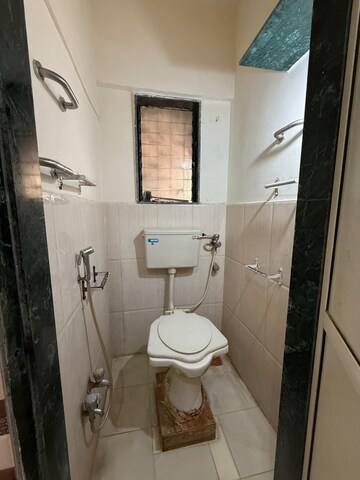 Bathroom in 1 BHK Apartment at Raj Shivam Society, Dahisar East – for Rent