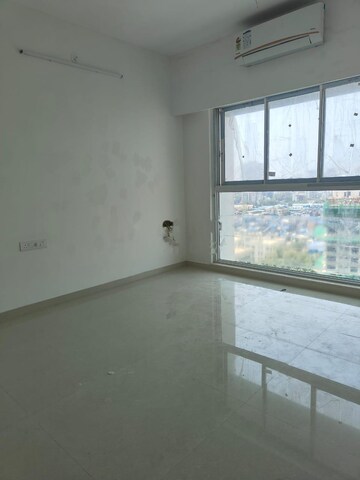 Room in 2 BHK Apartment at Rustomjee Erika, Bandra East – for Rent