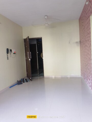 Living Room in 1 BHK Apartment at Veena Dynasty, Vasai East – for Rent
