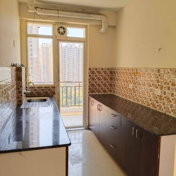 Kitchen in 2.5 BHK Apartment at Amrapali Zodiac, Sector 120 – for Rent