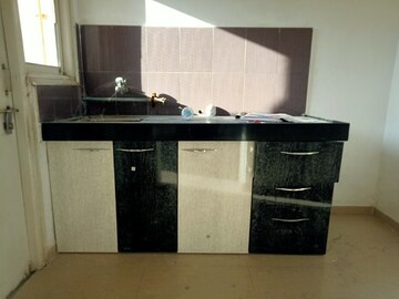Kitchen in 1 BHK Apartment at Applewood Satyesh Residency, Shela – for Rent