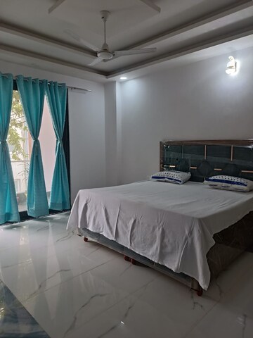 Bedroom in 3 BHK Builder Floor at Ansal Sushant Lok I, Sector 43 – for Rent