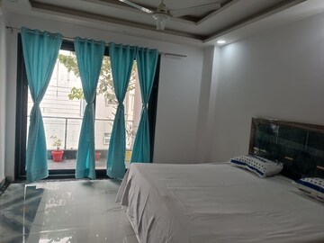 Bedroom in 3 BHK Builder Floor at Ansal Sushant Lok I, Sector 43 – for Rent
