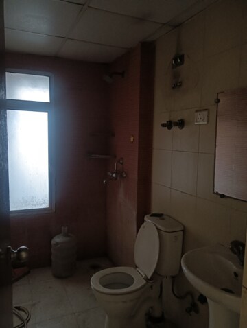 Bathroom in 3 BHK Apartment at Mahagun Mywoods, Sector 16c Greater Noida – for Rent