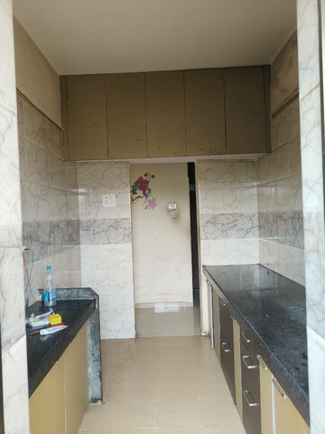 Kitchen in 1 BHK Apartment at K K Crystal Park, Palghar – for Sale