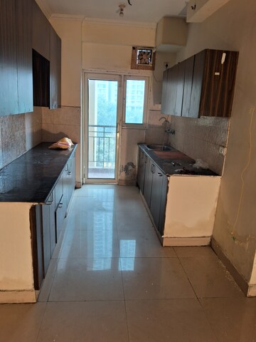 Kitchen in 2.5 BHK Apartment at Aims Golf City, Sector 75 – for Rent