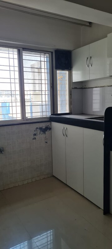 Kitchen in 1 BHK Apartment at Sancheti Eves Garden, Mundhwa – for Rent
