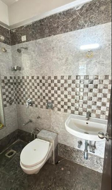 Bathroom in 2 BHK Apartment at Kamala Enclave, Borivali West – for Rent