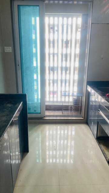 Kitchen in 1 BHK Apartment at Shree Ramdev Ritu Heights, Mira Road – for Rent