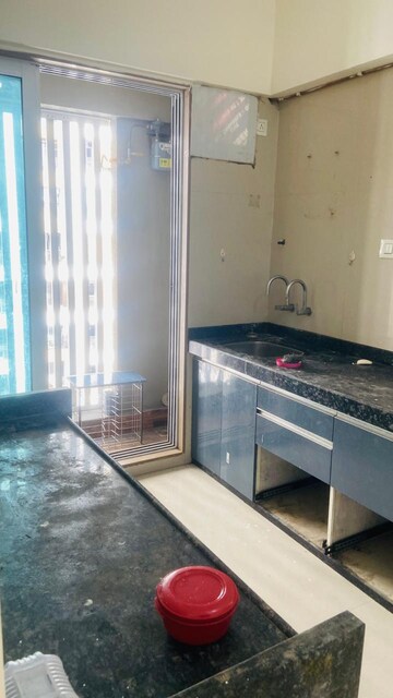 Kitchen in 1 BHK Apartment at Shree Ramdev Ritu Heights, Mira Road – for Rent