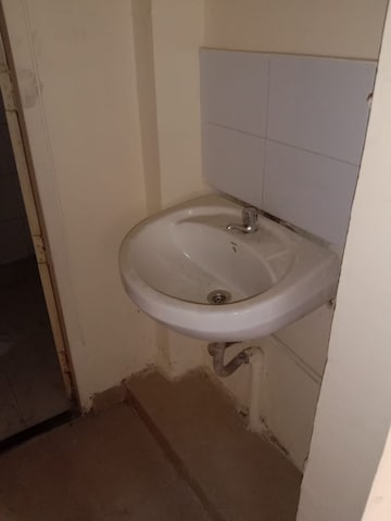 Bathroom in 1 BHK Apartment at New Mhada Tower, Malad West – for Rent