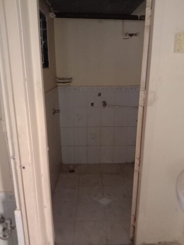 Bathroom in 1 BHK Apartment at New Mhada Tower, Malad West – for Rent