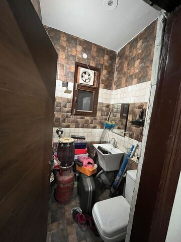 Bathroom in 3 BHK Builder Floor at Guru Nanak Enclave, Dhakoli Village – for Sale