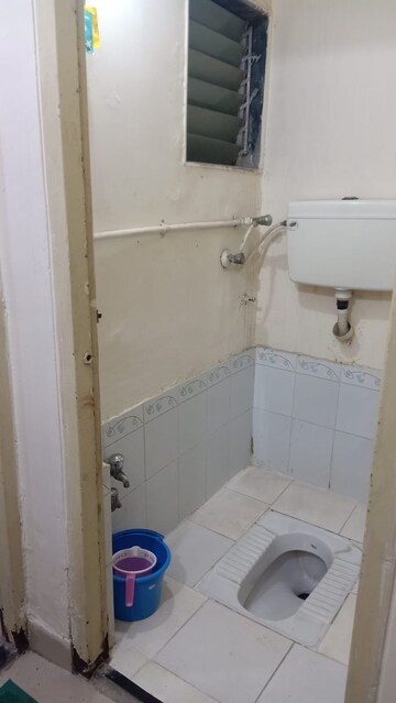 Bathroom in 1 BHK Apartment at New Mhada Tower, Malad West – for Rent