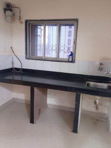Kitchen in 1 BHK Apartment at New Mhada Tower, Malad West – for Rent