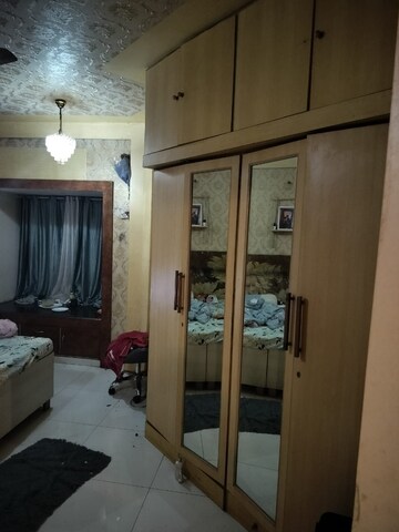 Living Room in Studio Apartment at Royal Palms, Goregaon East – for Rent
