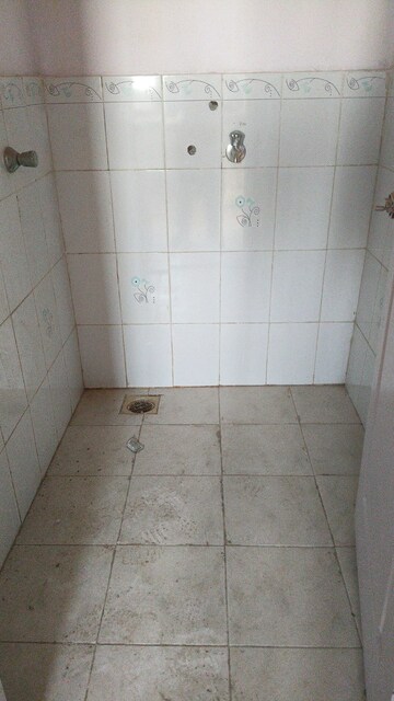 Bathroom in 1 BHK Apartment at New Mhada Tower, Malad West – for Rent
