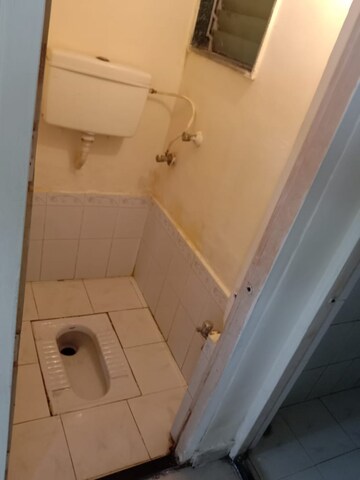 Bathroom in 1 BHK Apartment at New Mhada Tower, Malad West – for Rent