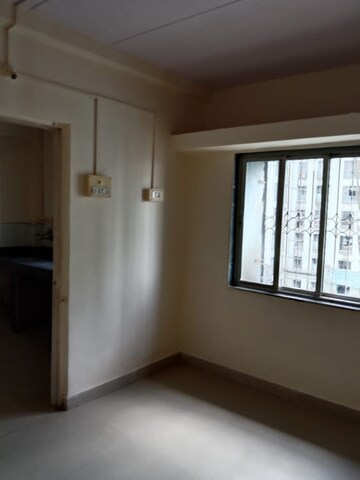 Room in 1 BHK Apartment at New Mhada Tower, Malad West – for Rent