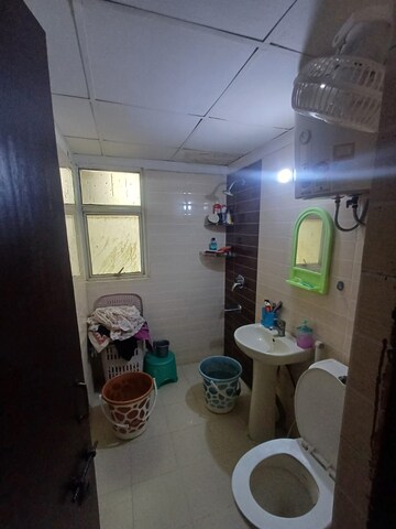 Bathroom in 3 BHK Apartment at Amrapali Zodiac, Sector 120 – for Sale