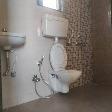 Bathroom in 2 BHK Apartment at Kamdhenu Gardenia, Ghot – for Rent