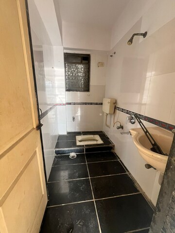 Bathroom in 3 BHK Apartment at Unique Twins Tower CHS, Sector 20 Kharghar – for Rent