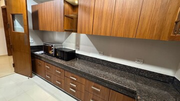 Kitchen in 4 BHK Apartment at Malcha Marg – for Rent