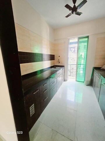 Kitchen in 2 BHK Apartment at Sanghvi Arham Arcade, Kharghar – for Rent