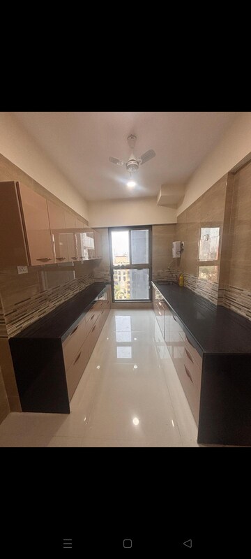Kitchen in 2 BHK Apartment at Rajesh Raj Infinia, Malad West – for Rent