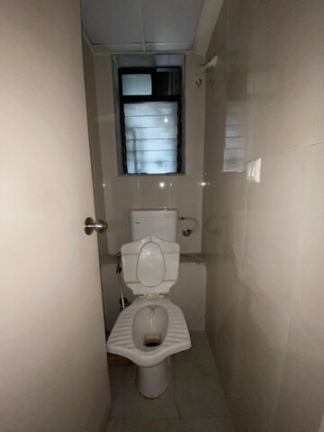 Bathroom in 1 BHK Apartment at Lodha Palava Crown, Dombivli East – for Rent