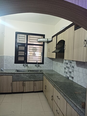 Kitchen in 3 BHK Builder Floor at Guru Nanak Enclave, Dhakoli Village – for Sale