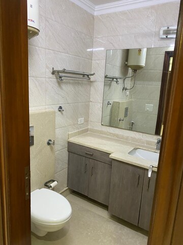 Bathroom in 3 BHK Builder Floor at DLF Queens Court, Chittaranjan Park – for Rent