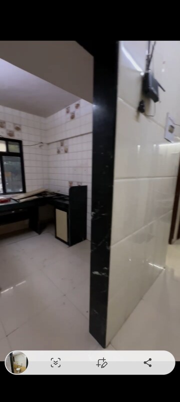 Kitchen in 2 BHK Apartment at Poonam Paradise CHS, Mira Road – for Rent
