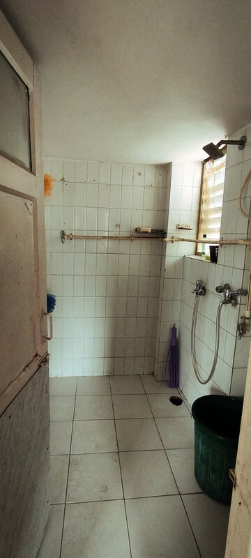 Bathroom in 1 BHK Apartment at Dwarkesh Dham, Borivali West – for Rent
