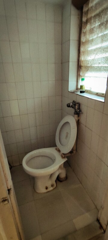 Bathroom in 1 BHK Apartment at Dwarkesh Dham, Borivali West – for Rent