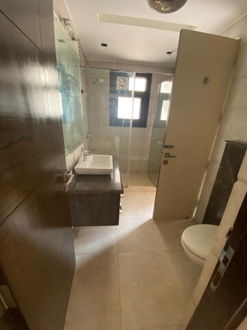 Bathroom in 4 BHK Apartment at East Of Kailash – for Sale